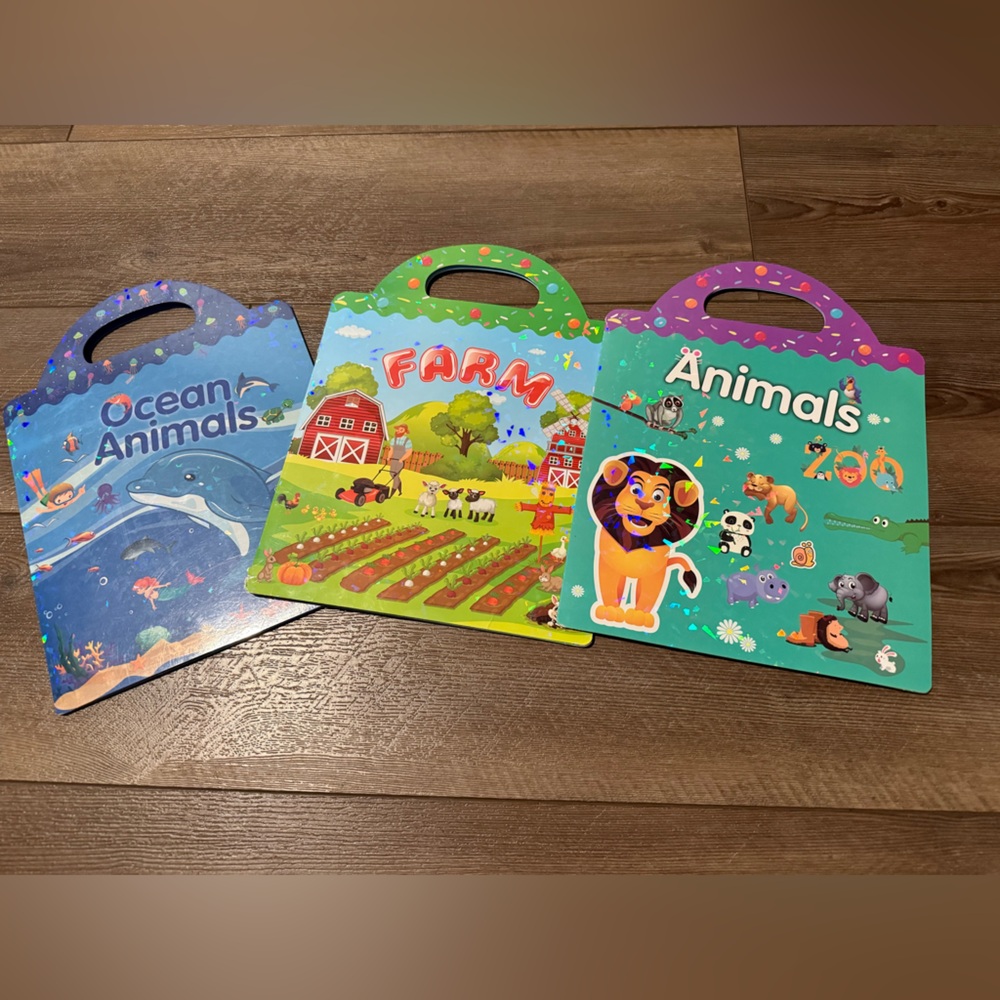 Set of 3 reusable sticker books.